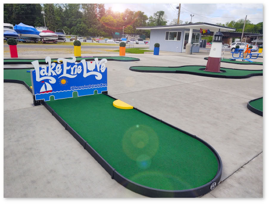 Putter Port hole with Lake Erie Love sign